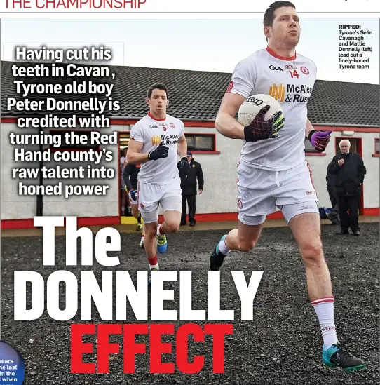  ??  ?? RIPPED:
Tyrone’s Seán Cavanagh and Mattie Donnelly (left) lead out a finely-honed Tyrone team