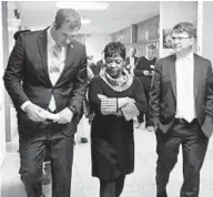  ?? TAYLOR DEVILLE/BALTIMORE SUN ?? Baltimore County Executive Johnny Olszewski Jr., left, Maryland House Speaker Adrienne Jones and Baltimore County Council member Tom Quirk tour Lansdowne High in 2019.