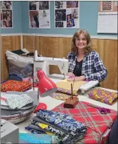  ?? CONTRIBUTE­D ?? Deborah Wood works in the quilt room at Gleanings for the Hungry.