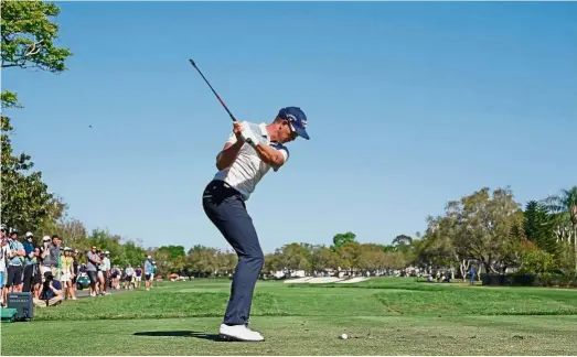  ?? — AFP ?? Focused: Henrik Stenson hits a shot from the 11th tee during the third round of the Arnold Palmer Invitation­al at Bay Hill in Florida on Saturday.