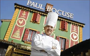  ?? LAURENT CIPRIANI / AP ?? French Chef Paul Bocuse stands outside his famed Michelin three-star restaurant L’Auberge du Pont de Collonges in Collonges-au-Mont-d’or, central France. Bocuse, a master of French cuisine, has died at 91.