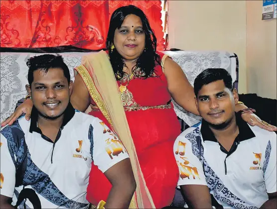  ?? Picture: ATU RASEA ?? Avinesh Avishal Rai, left, also known as Junior Balram, with his family.