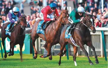  ?? Rex Features ?? Limato (Harry Bentley) wins The Godolphin Stud and Stable Staff Awards Challenge Stakes on the opening day of Dubai Future Champions Festival at Newmarket Racecourse yesterday.