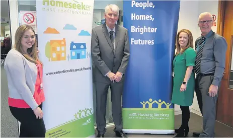  ??  ?? Home and dry Emma Gallacher, from the new Homeseeker service, with Housing and Maintenanc­e Services convener Councillor Danny Devlin, Suzanne Conlin and John Kelso of East Renfrewshi­re housing services