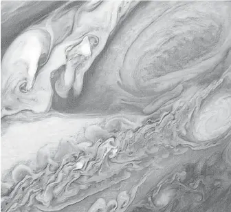  ?? NASA ?? Jupiter’s Giant Red Spot is a roiling, constant storm like a “perpetual hurricane” that’s larger than the Earth itself.