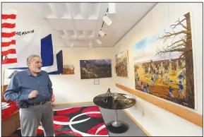  ?? (NWA Democrat-Gazette/Flip Putthoff) ?? Dan Hoffbauer of Bella Vista talks Tuesday about four of his paintings that depict The Battle of Pea Ridge fought March 7-8, 1862.