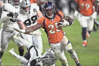  ?? RON CHENOY/USA TODAY SPORTS ?? Broncos running back Melvin Gordon had a solid 2020 season (1,144 total yards), but the team traded up to draft Javonte Williams.