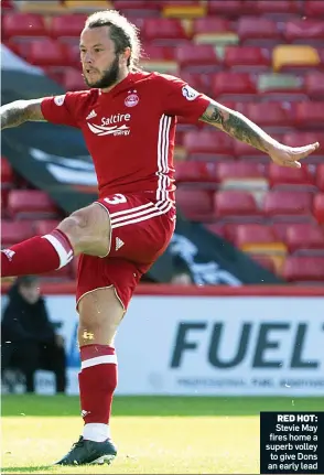  ??  ?? RED HOT: Stevie May fires home a superb volley to give Dons an early lead