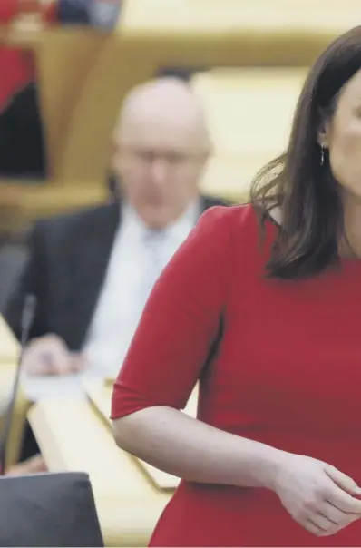  ??  ?? 0 Public finance minister Kate Forbes set out SNP plans to introduce a new 2 per cent rate of land and buildings transactio­ns tax on residentia­l properties worth more than £2 million in her Budget speech