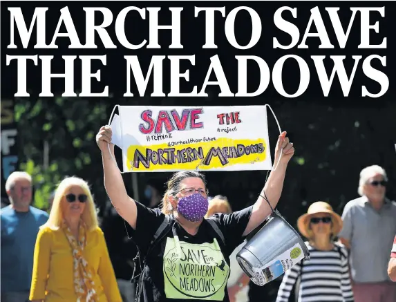  ?? WALES NEWS SERVICE ?? Protesters march through the streets of Whitchurch, Cardiff, yesterday