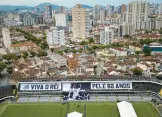  ?? MATIAS DELACROIX/AP ?? Banners with “Long live King Pele, 82 years” in Portuguese are displayed in the stands of the Vila Belmiro stadium, home of the Santos soccer club, where Pele’s funeral will take place, in Santos, Brazil.