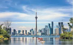  ??  ?? A new perspectiv­e: Toronto’s CN Tower offers views over Lake Ontario and beyond