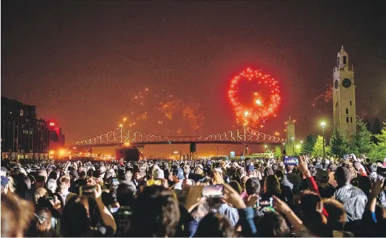  ?? YANNICK KHONG/AMPME ?? The AmpMe app is used to provide the music sound system from about 22,000 cellphones during Montreal’s 375th anniversar­y near the Jacques Cartier Bridge.