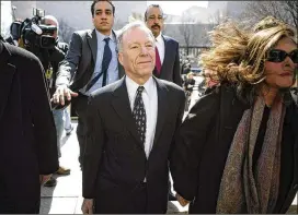  ?? DOUG MILLS / THE NEW YORK TIMES 2007 ?? Lewis “Scooter” Libby, former chief of staff to Vice President Dick Cheney, leaves a federal courthouse in March 2007 with his wife, Harriet Grant, after being convicted of perjury in the case of of a covert CIA agent.
