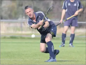  ??  ?? BANG! Simon Farmers of Yanac Tigers leads into a powerful pass during Wimmera Hockey Associatio­n action. Picture: SIMON KING