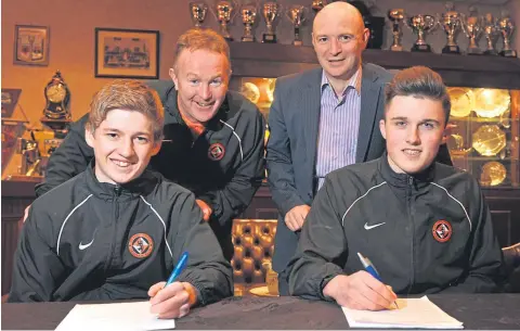  ??  ?? Stevie Campbell with the then Dundee United charman, Stephen Thompson, on the day in 2013 when two of his proteges, Ryan Gauld and John Souttar signed for the club