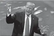  ?? JACQUELYN MARTIN /AP PHOTO ?? President Donald Trump speaks to the media about the testimony of former special counsel Robert Mueller to Congress in Washington on Wednesday at the White House.