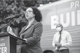  ?? Brett Coomer / Staff file photo ?? Carla Brailey, vice chair of the Texas Democratic Party, speaks at the DNC’s “Build Back Better” tour stop in August here. Brailey, a TSU professor, said she “couldn’t sit on the sidelines anymore.”