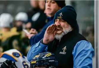  ?? ANDREW BURKE-STEVENSON FOR THE GLOBE ?? Arlington Catholic first-year coach Curt Colarullo (above) won his debut while Burlington’s Bob Conceision Jr. suffered a setback.