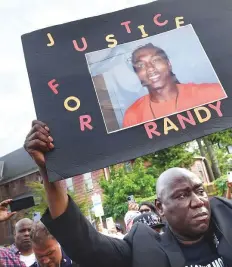  ?? AP ?? ■ Civil rights attorney Benjamin Crump takes part in a march for Justice for Richard “Randy” Cox from the Stetson Library to the New Haven Police Department on July 8, 2022.