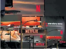  ?? Philip Cheung, © New York Times Co. ?? Billboards advertise content by Netflix along Sunset Boulevard in West Hollywood, Calif., on Oct. 10.