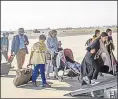  ??  ?? Afghans leaving for the UK