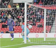  ??  ?? The Tranmere keeper can only watch as Chris Maguire scores.