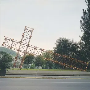  ?? ESTATE OF PIERRE AYOT / SODRAC ?? Forty years after then-mayor Jean Drapeau ordered it dismantled, a project to remount Pierre Ayot’s sculpture of a cross on its side has hit a last-minute snag because Montreal Mayor Denis Coderre is concerned people could take offence.