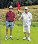  ??  ?? Dave Catt (right) scored a hole in one on the sixth hole. He is pictured with club captain Keith Watson