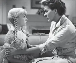  ?? EVERETT COLLECTION ?? Christine Penmark (Nancy Kelly) confronts daughter Rhoda (Patty McCormack) in the 1956 horror film “The Bad Seed.”