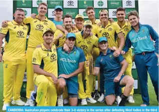  ?? ?? CANBERRA: Australian players celebrate their 3-0 victory in the series after defeating West Indies in the third one-day internatio­nal (ODI) cricket match at the Manuka Oval in Canberra on February 6, 2024. — AFP