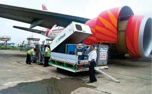  ??  ?? Ecopower Engine Wash by AIESL owned by Air India group