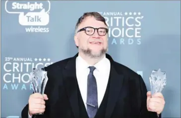  ?? LACROIX/AFP ?? Guillermo del Toro, recipient of the best director and best picture awards for the 23rd annual Critics’ Choice Awards Press Room on January 11 in Santa Monica, California. attends