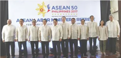  ??  ?? LABOR MINISTERS – Labor Secretary Silvestre Bello III (fifth from left) hosts his Associatio­n of South East Asian Nations (ASEAN) counterpar­ts in the ASEAN Labor Ministers’ Retreat held yesterday at the Marco Polo Hotel in Davao City. (Keith Bacongco)