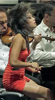  ?? Virtuosa ?? Yuja Wang, 31 anni, si è assicurata un posto di rilievo nel novero dei migliori interpreti musicali del mondo grazie alla sua capacità di sintetizza­re raffinatez­za tecnica, talento e sensibilit­à emotiva. Il suo repertorio spazia da Mozart a Gershwin.