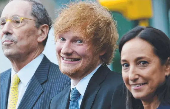  ?? ?? A very relieved Ed Sheeran with his lawyers outside the Manhattan Federal Court after winning his high-stakes music copyright case. Picture: AFP