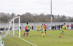  ?? James Eastup ?? Runcorn Linnets striker Brian Matthews ( far right) opens the scoring with a header for the first of his brace in the 2-2 draw with Abbey Hey at the Millbank Linnets Stadium last Saturday.