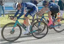  ?? ?? Noah Hollamby, left, and Reef Roberts, pictured contesting the finish of this year’s Aoraki secondary schools road race, won five medals between them at the South Island championsh­ips.