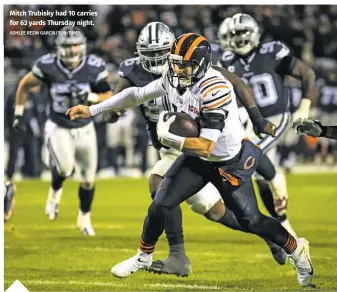  ?? ASHLEE REZIN GARCIA/SUN-TIMES ?? Mitch Trubisky had 10 carries for 63 yards Thursday night.