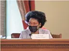  ?? KYLE ROBERTSON/COLUMBUS DISPATCH ?? House Minority Leader Emilia Sykes listens to an Ohioan voice his concern over Ohio House and Senate district draft maps during a meeting at the Ohio Statehouse in Columbus.