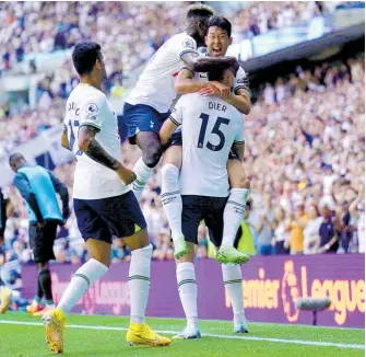  ?? Photo / AP ?? Big hugs for Tottenham’s Eric Dier after he scored their side’s second goal against Southampto­n.