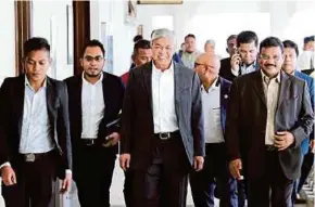  ?? PIC BY EIZAIRI SHAMSUDIN ?? Datuk Seri Dr Ahmad Zahid Hamidi arriving at the Kuala Lumpur High Court yesterday.