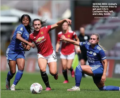  ?? VISIONHAUS/GETTY IMAGES ?? SEEING RED: United’s Kirsty Hanson tries to get past City’s Lachante Paul, left, and Libby Smith