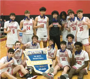  ?? CONTRIBUTE­D PHOTO ?? Parkland’s boys basketball team celebrates a 57-43 win over Liberty that gave the Trojans their second straight District 11 6A title at Easton Area Middle School on Saturday.