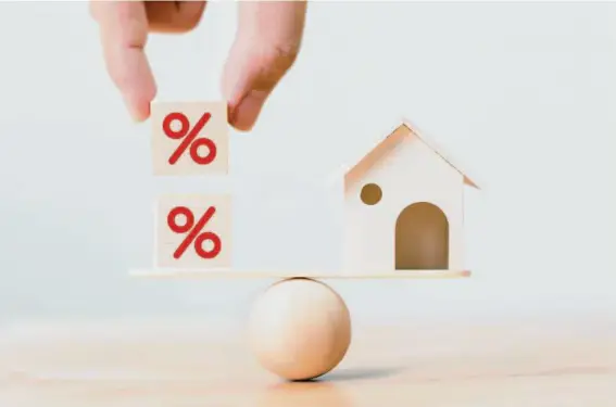  ?? SHUTTERSTO­CK ?? Lower rates are absolutely a boon for buyers, sellers, and the overall housing market. But there’s a caveat: Fluctuatio­ns in rates can make it difficult for both buyers and sellers to plan their budgets.