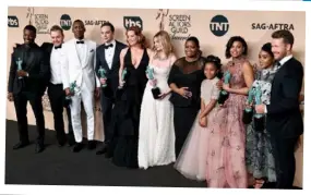  ??  ?? Oscar winner Mahershala Ali is Hollywood’s new golden boy. FROM LEFT: As Boggs in The Hunger Games with Jennifer Lawrence; in his Oscar-winning best supporting actor role in Moonlight with his young costar Alex Hibbert; with his Hidden Figures co-stars...