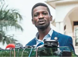  ??  ?? BOBI WINE at a press conference at his home in Magere on January 15, the day after the presidenti­al election.