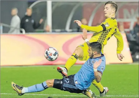  ?? [ADAM CAIRNS/DISPATCH] ?? Crew forward Pedro Santos, right, kicks the ball past New York City FC defender Ronald Matarrita during the second half. Rodney Wallace, F, NYCFC: First half— Second— Shots: Saves: Corner kicks: