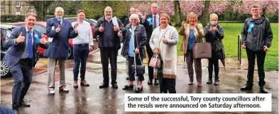  ??  ?? Some of the successful, Tory county councillor­s after the resuls were announced on Saturday afternoon.