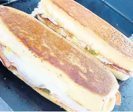  ?? CONTRIBUTE­D PHOTOS ?? Introducin­g TOW’s Cubano sandwich.